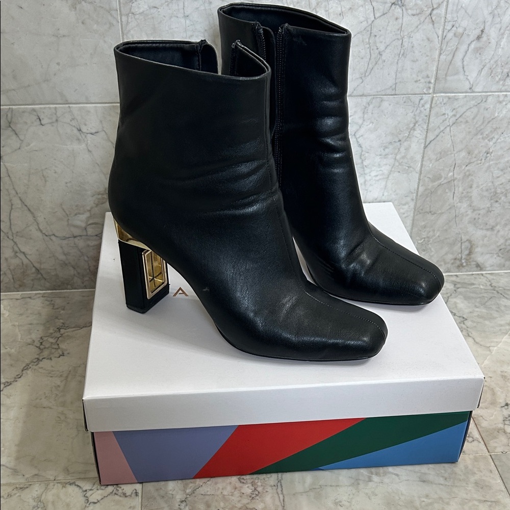 Elegant Black Ankle Boots with Gold Heel